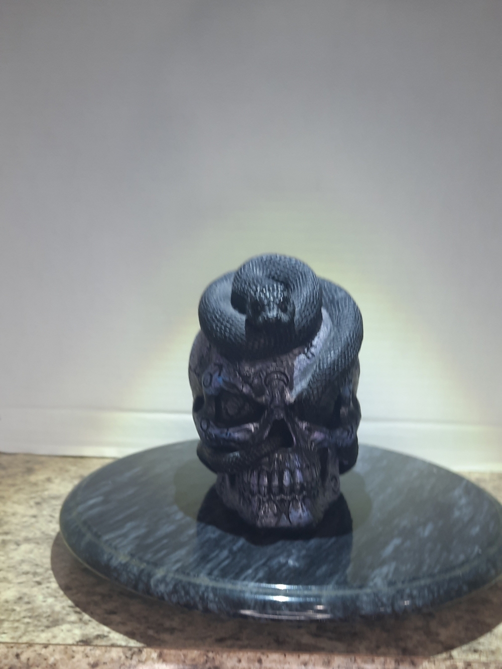 Spirit Halloween Black Snake Coiled on Skull Resin Sculpture